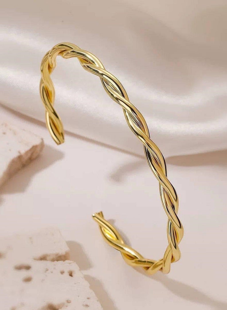 WARD Women's Bracelet Twisted Without Clasp in Gold Color, Made of Stainless Steel - Image 1