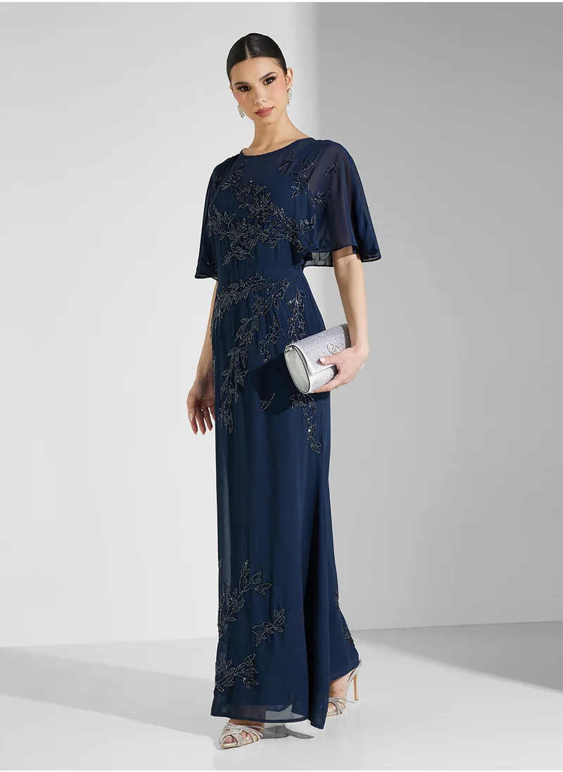 مايا Placement Embellished Cape Sleeve Maxi Dress