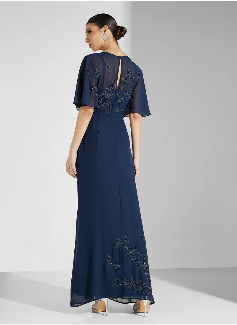 مايا Placement Embellished Cape Sleeve Maxi Dress