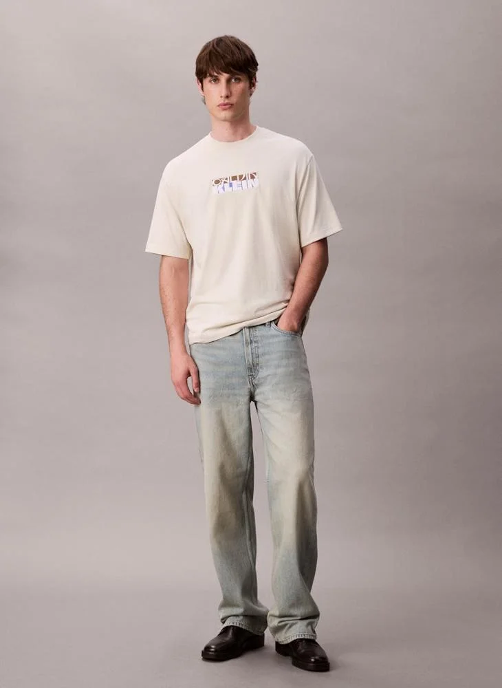 Calvin Klein Jeans  Block Logo Graphic Relaxed T-Shirt for Men | Best Price UAE