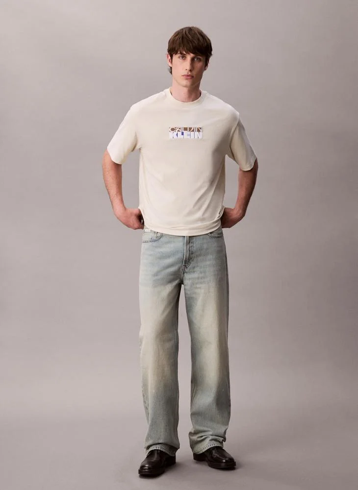 Calvin Klein Jeans  Block Logo Graphic Relaxed T-Shirt for Men | Best Price UAE