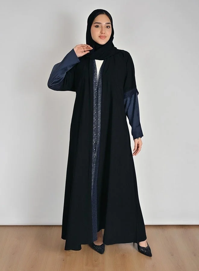 Hawraa Abaya Black Abaya with a Flowing Silhouette, Navy Satin Sleeves, and Lace Accents
