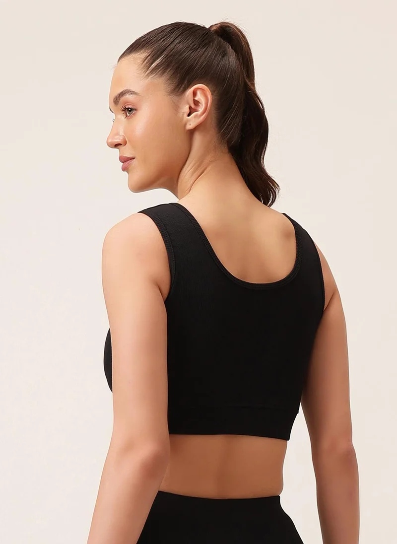 كلوفيا Clovia Medium Impact Ribbed Sports Bra in Black with Removable Cups