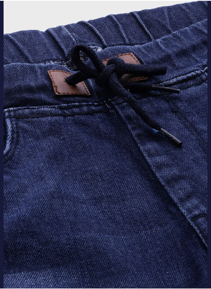 Campus Sutra Jeans with Side Stripes