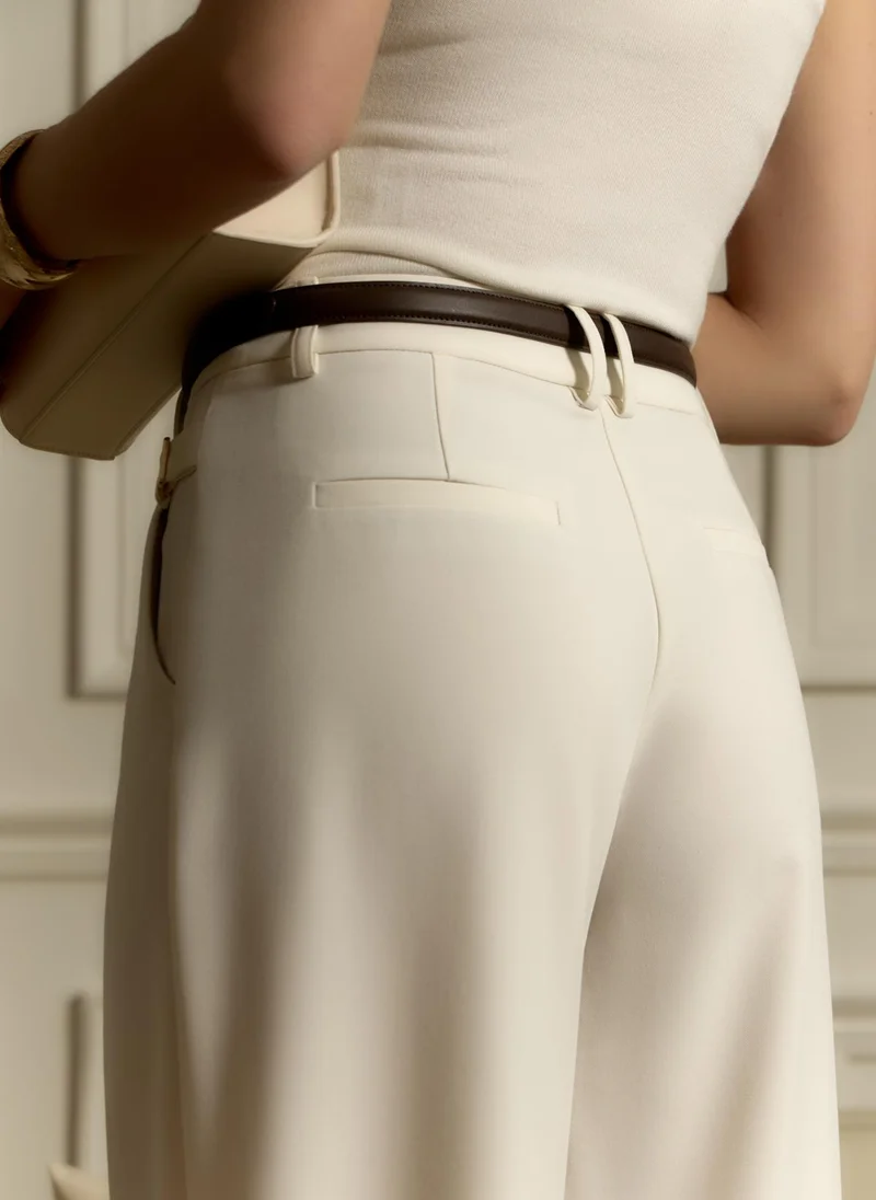 Lichi Loose suiting trousers with eco-leather belt