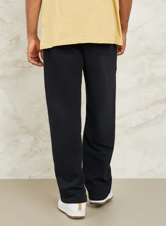 Styli Fleece Pintuck Wide Leg Jogger with Badge Detail