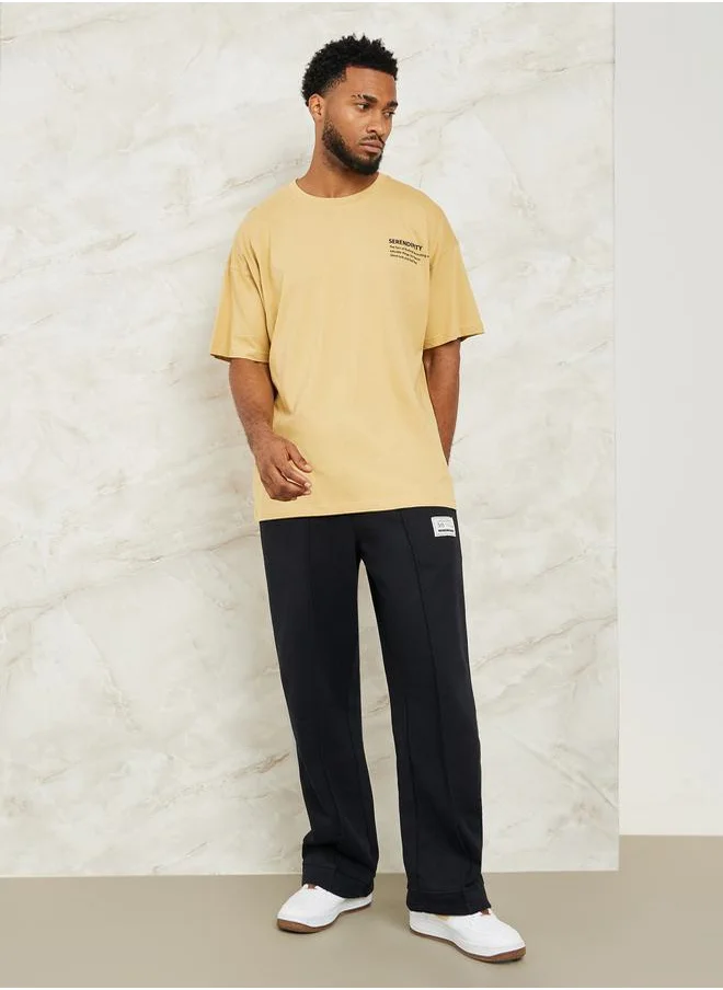 ستايلي Fleece Pintuck Wide Leg Jogger with Badge Detail