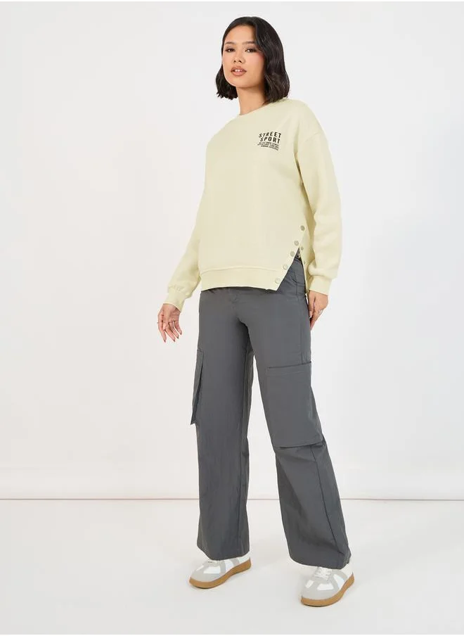 Styli Dropped Shoulder Printed Sweatshirt with Button Detail
