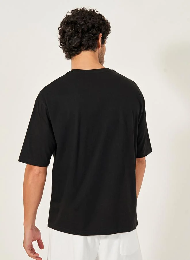 Styli Oversized Varsity Slogan Training T-Shirt