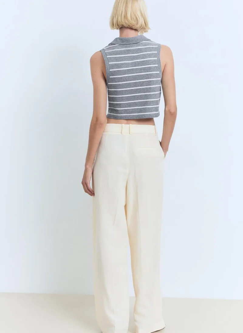 مانجو Striped cropped polo shirt