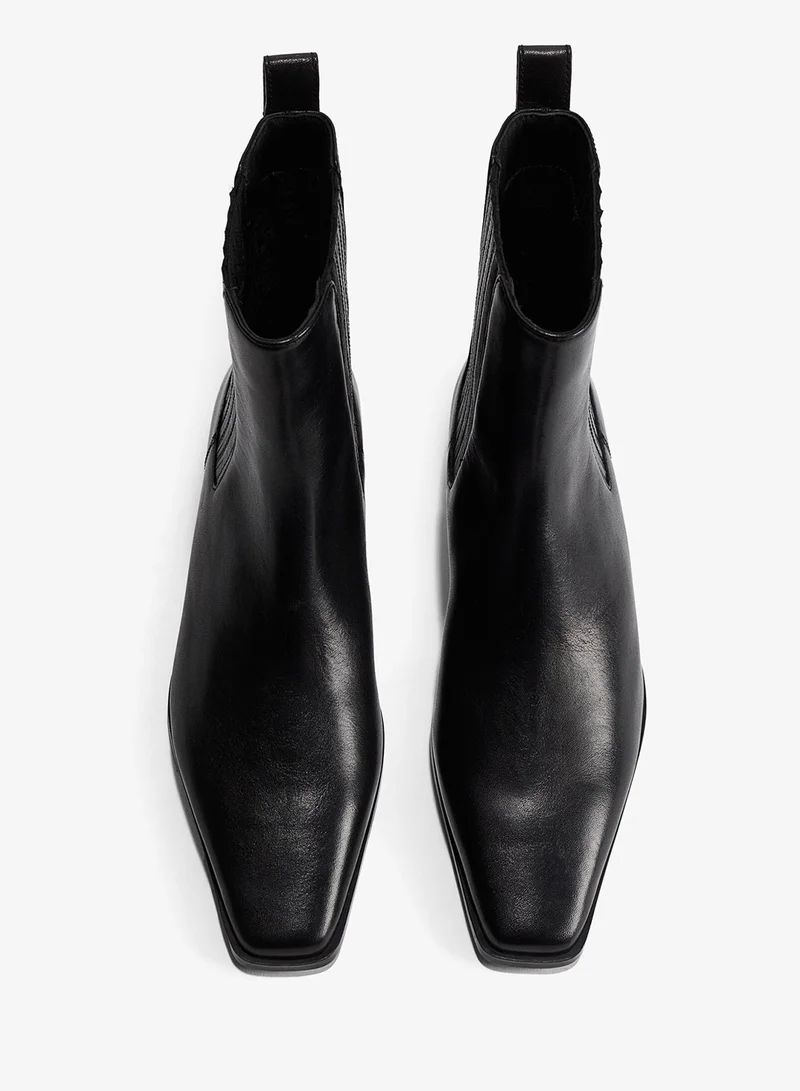 اتش اند ام أحذية الكاحل الجلدية