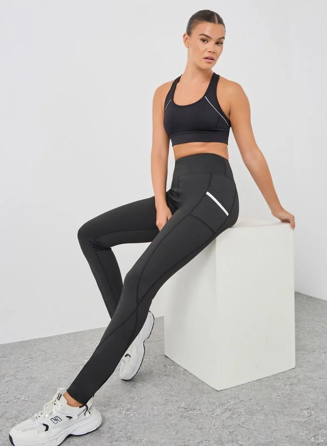 Side Pocket Reflective Detail Raw Edge Leggings