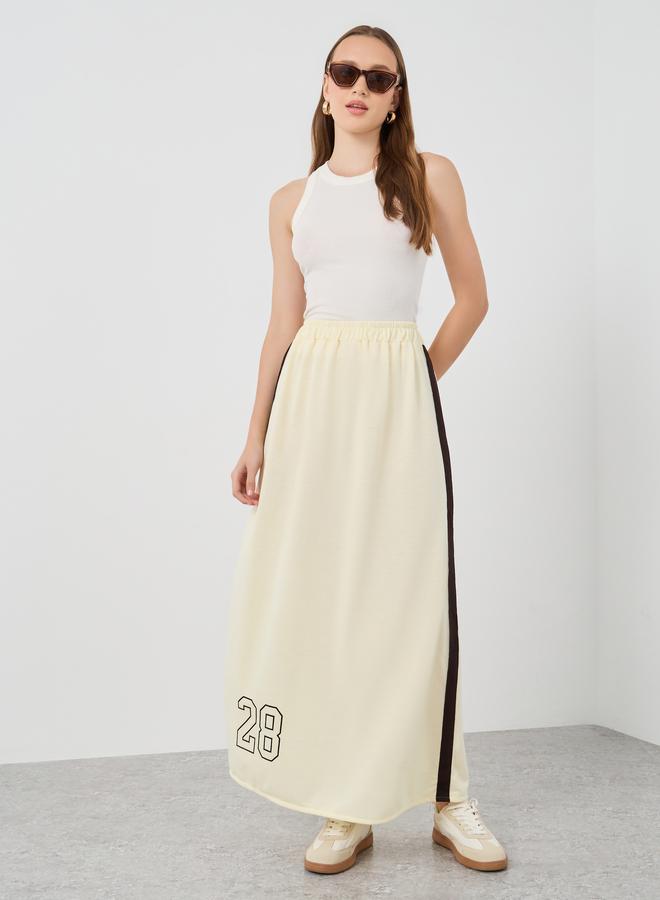 تايك تو تنورة ماكسي - بطبعات جرافيك وشريط جانبي - Image 1