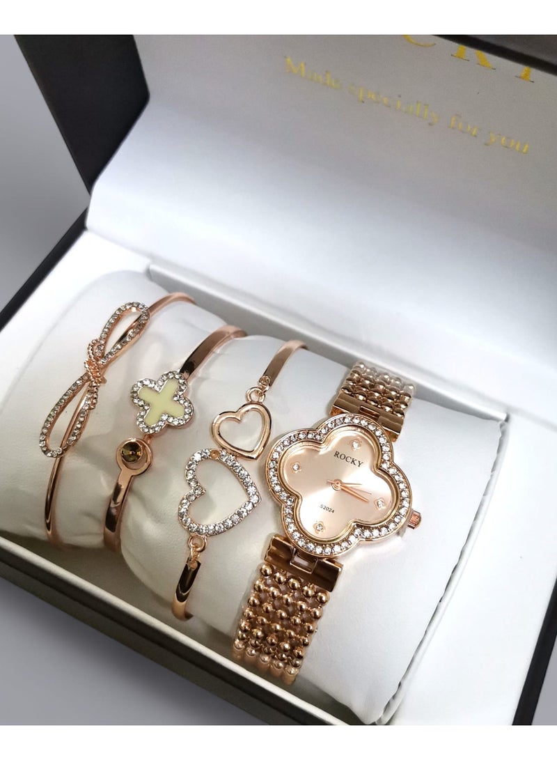 روكي طقم نسائي ذهبي ماركة روكي يتكون من ساعة ومجموعة من الاساور من الستانلس ستيل - Image 4