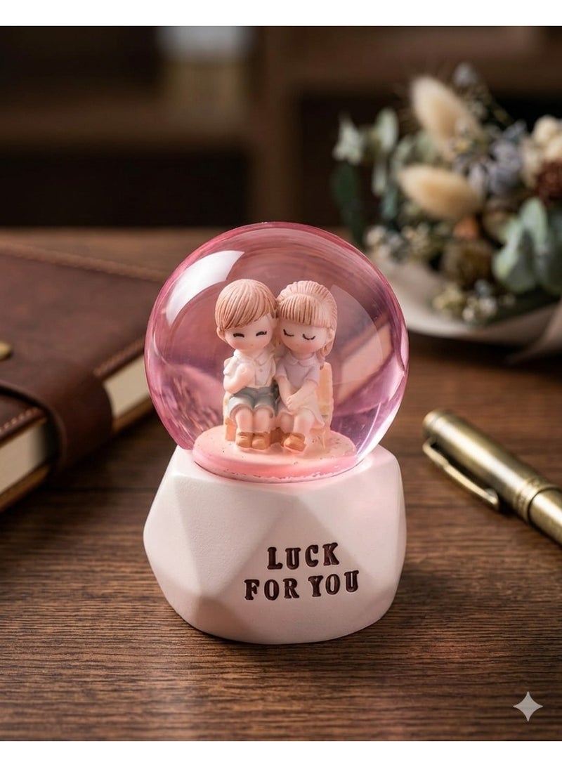 Crystal glass snow globe with characters and decorative base - a luminous gift for occasions with lighting