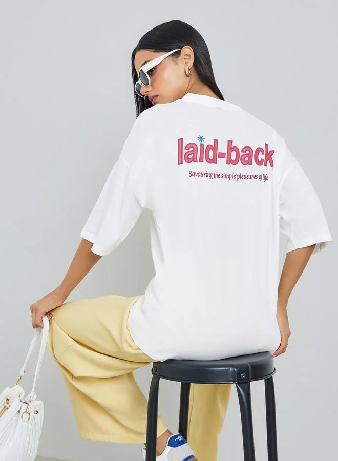 Styli Cream Laid-Back Front and Back Puff Print 100% Cotton Oversized T-Shirt