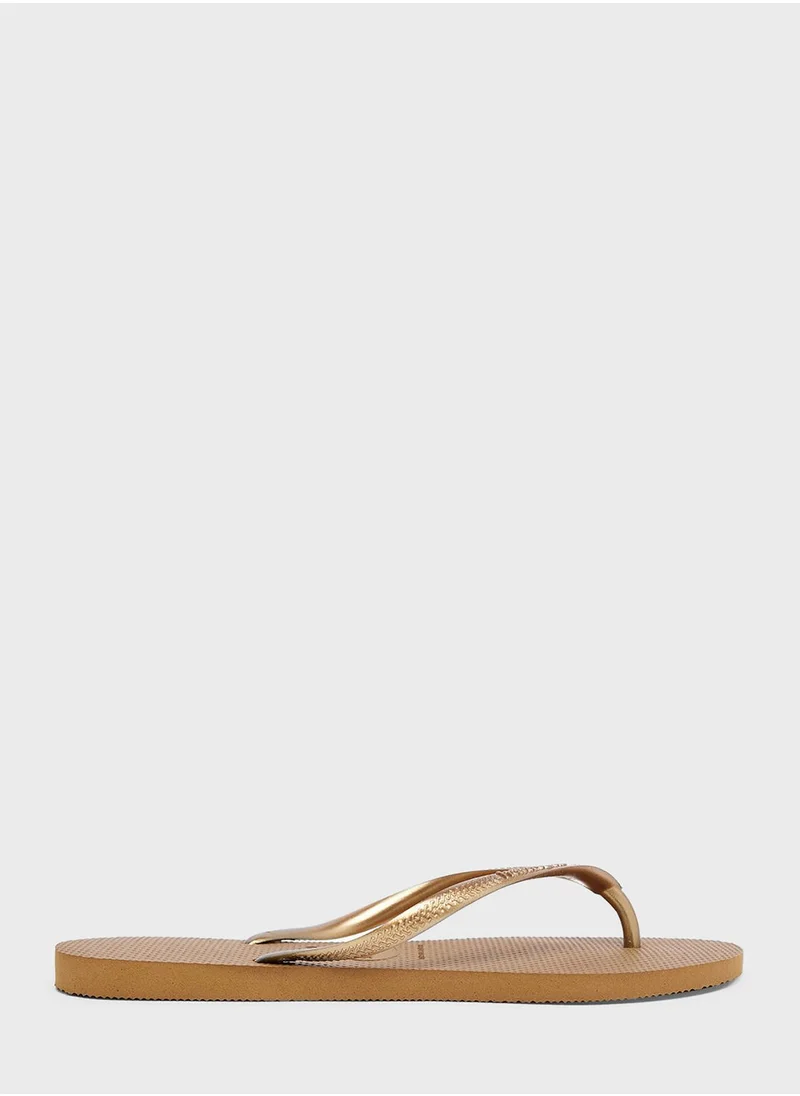 هافاياناس Metallic Strap Flip Flops