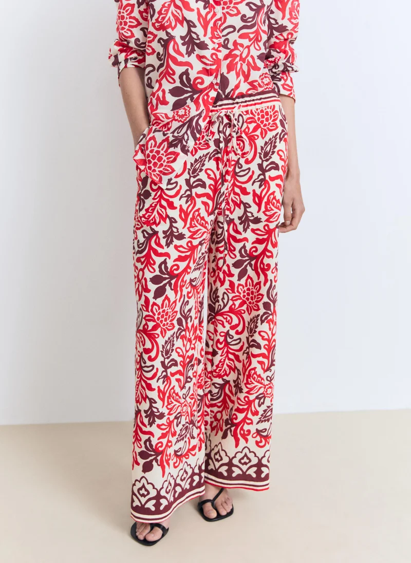 MANGO Flowy printed trousers