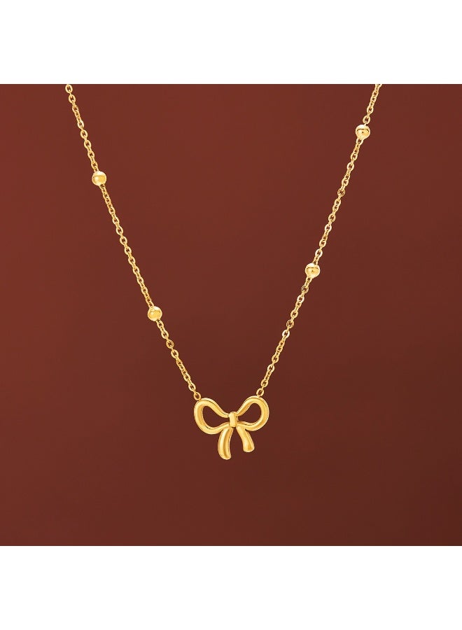 يوكانبي طقم مجوهرات أنيق من ٤ قطع للنساء – عقد، سوار، حلق وخلخال بتصميم فيونكة | من التيتانيوم باللون الذهبي - Image 3