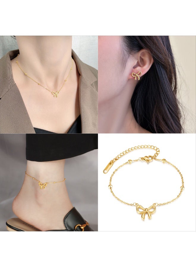 يوكانبي طقم مجوهرات أنيق من ٤ قطع للنساء – عقد، سوار، حلق وخلخال بتصميم فيونكة | من التيتانيوم باللون الذهبي - Image 1