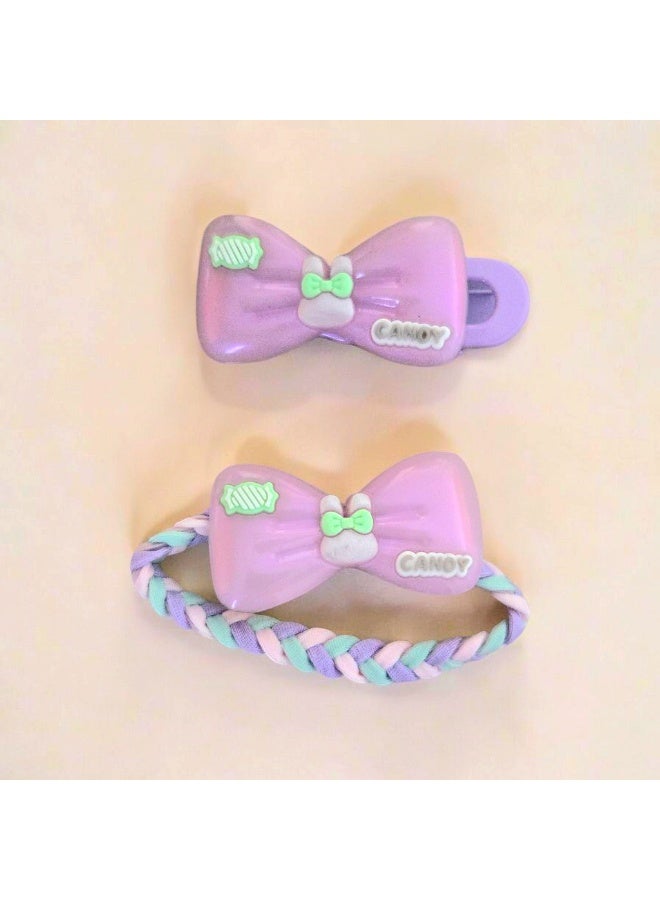 مجموعة من مشبك و ربطة شعر فيونكة للفتيات باللون البنفسجي - Image 1