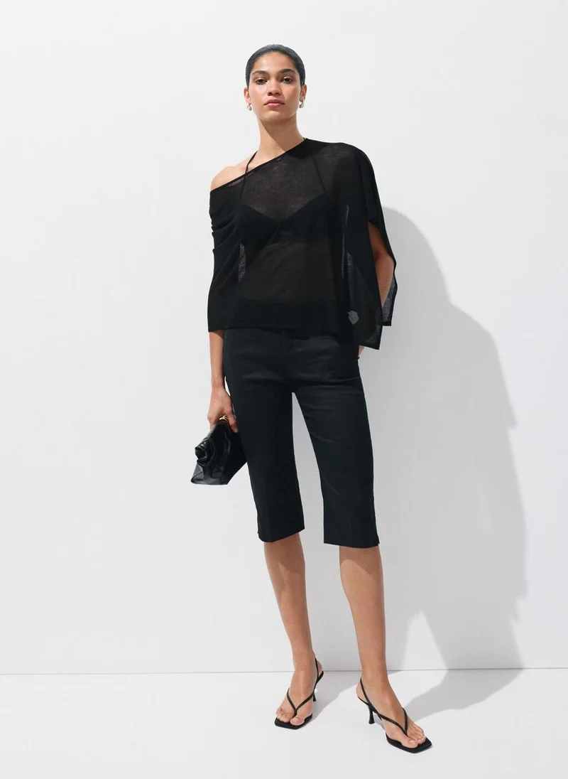Mango 99-NEGRO Asymmetrical Knitted Cape for Women | Best Price UAE