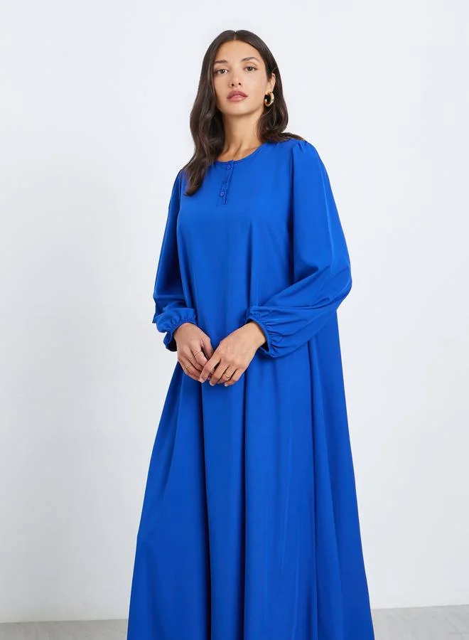 ستايلي جلابية بأكمام بالون وأزرار أمامية