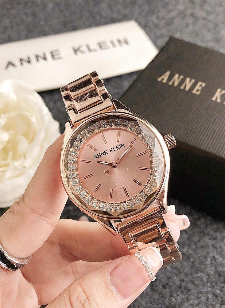 Anne Klein Women's Tonneau Quartz Zircon Rose Gold Fashion Watch with Rose Gold Stainless Steel Strap