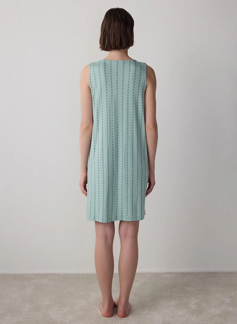 بنتي قميص نوم لينّا مزهر بأزرار بلون أخضر نعناعي فاتح