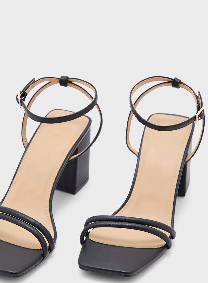 ترافل من نمشي Block Heel Double Front Strap Sandal