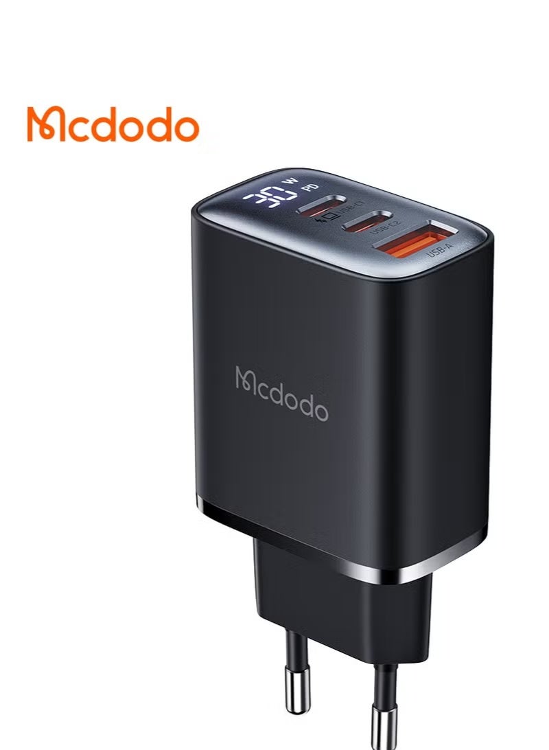 Mcdodo Fast Charging CH-218 30W , 2 Type-C Ports + USB-A Port with Digital Display for Real-Time Power , Fast Charging Compatible with PD, QC4.0, PPS, AFC, SCP, SFC , Ideal for Phones, Tablets, Laptops, Smartwatches and More , Compact and Sleek Design with 8 Layers of Protection to Ensure Safe and Efficient Charging - Image 1