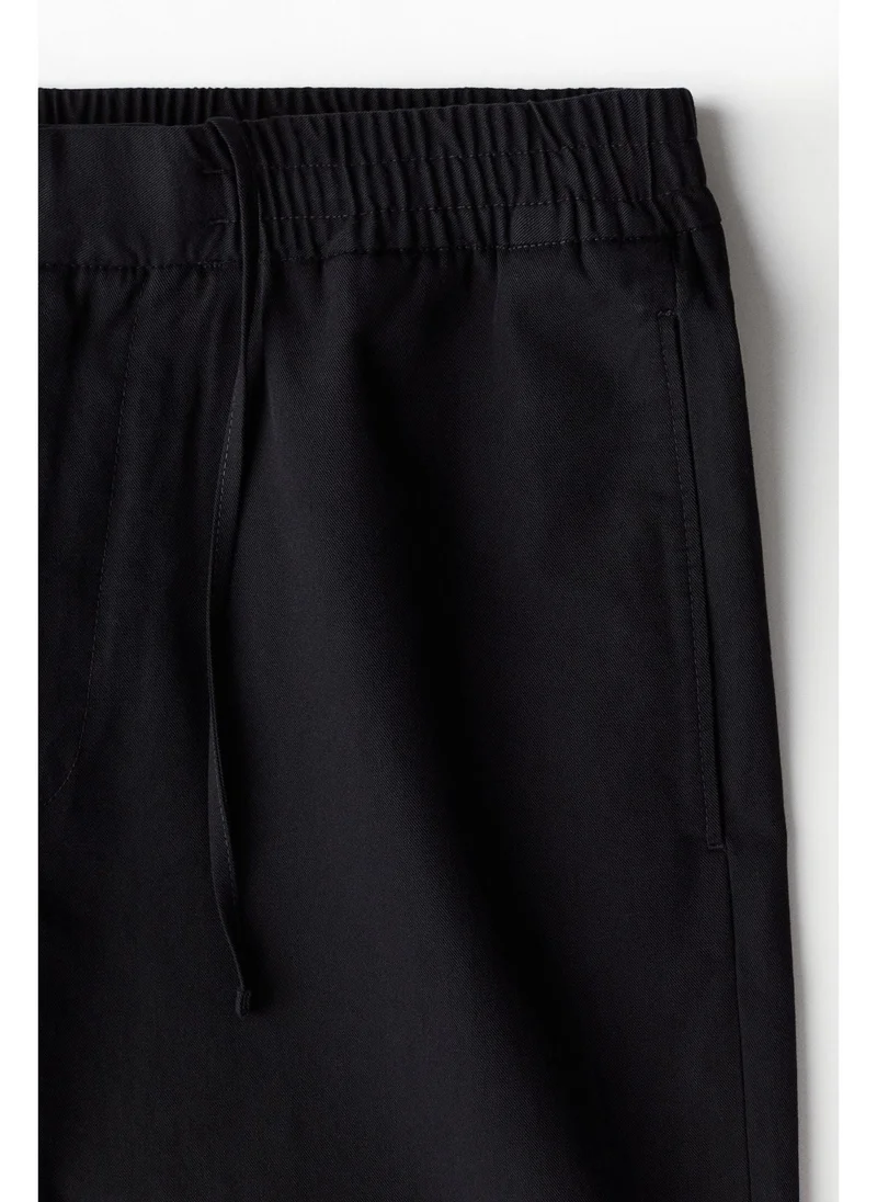 اتش اند ام Relaxed Fit cotton-blend twill trousers