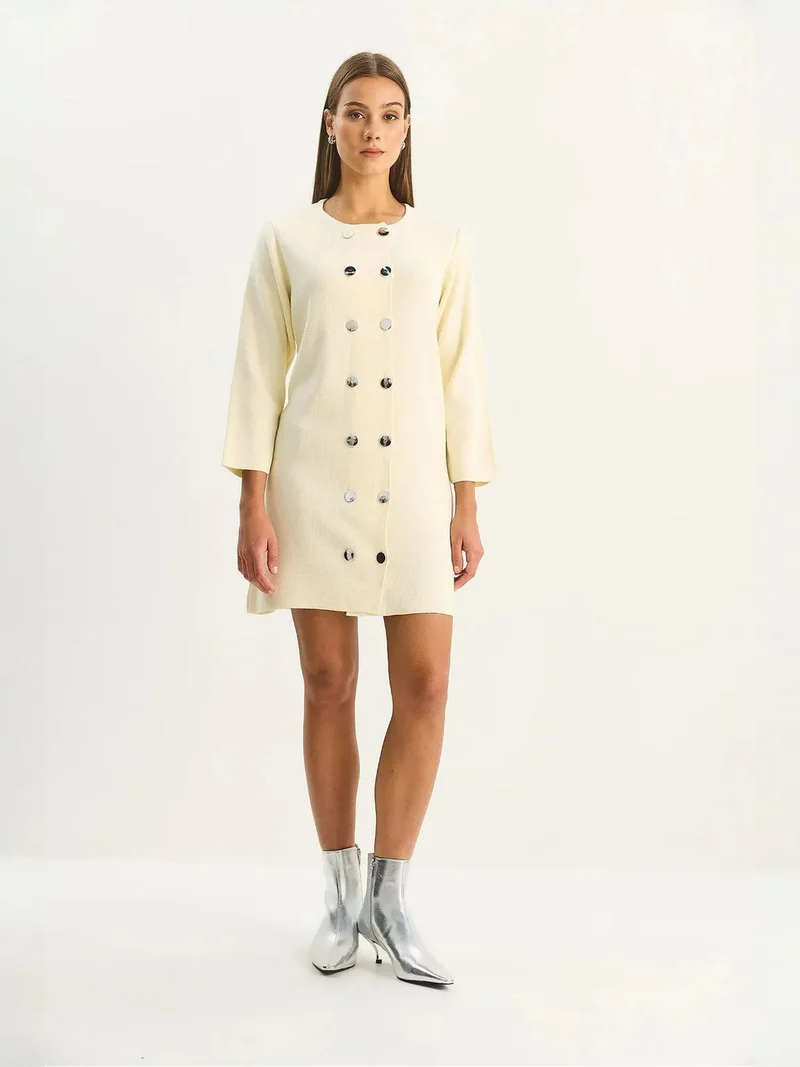 بيانكو لوتشي فستان قصير محبوك من لوكسي بأزرار