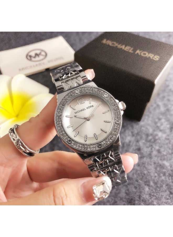 ام كي Michael Kors Women's Silver - Tone Watch with Crystal - Embellished Bezel and Logo - Engraved Bracelet