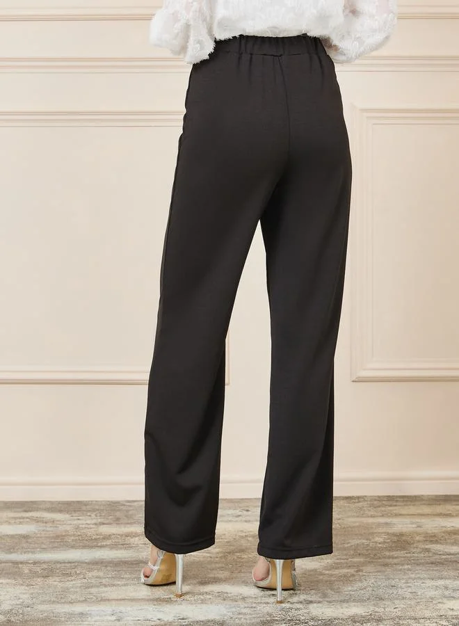 ستايلي Pintuck Asymmetric Button Closure Flared Pants