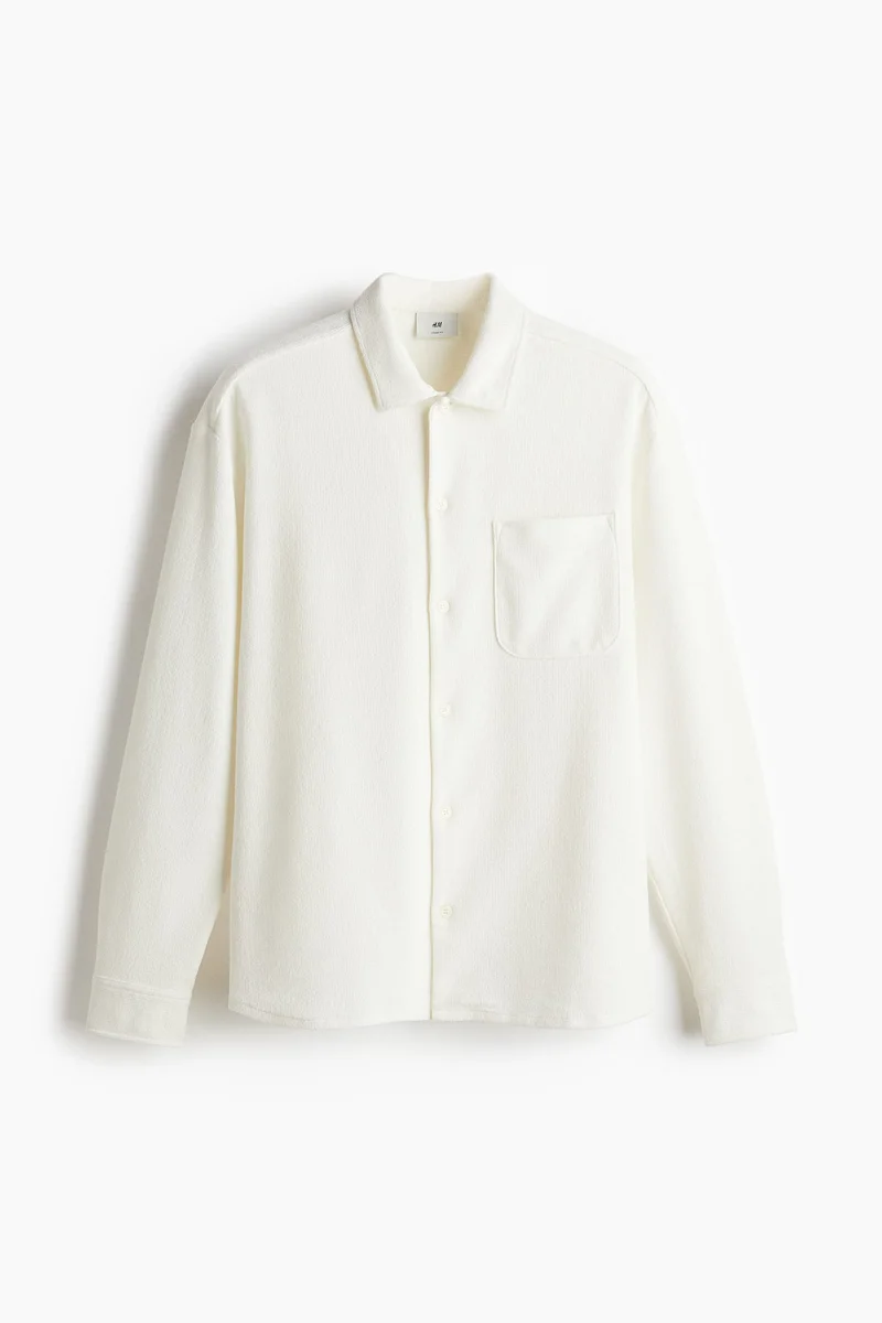 اتش اند ام قميص بقصّة واسعة وتصميم منقوش