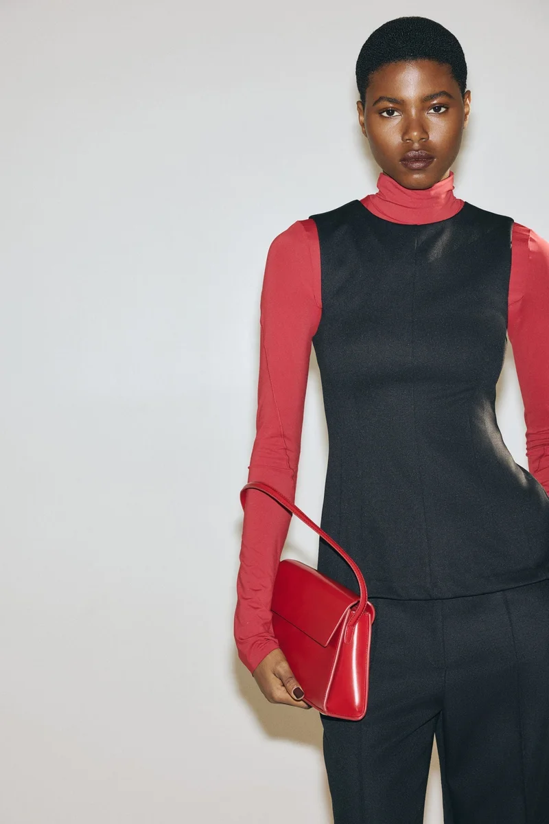 H&M Punto di Roma peplum top