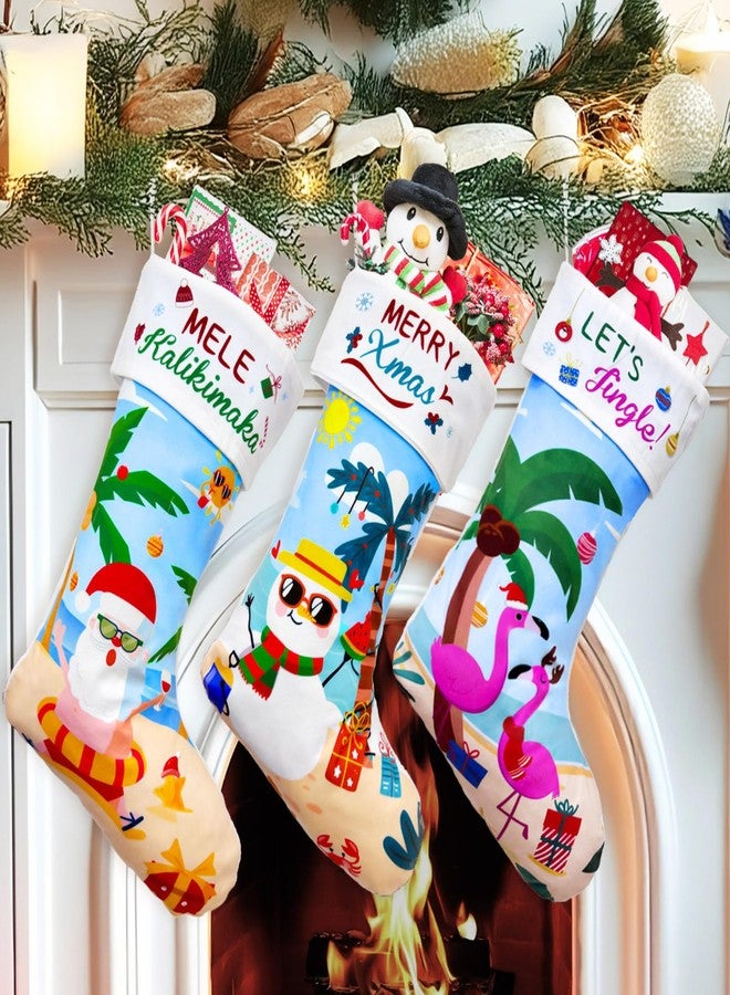 أور ورم جوارب عيد الميلاد من OurWarm، عبوة من 3 قطع، جوارب زرقاء بطول 18 بوصة بتصميمات هاواي: سانتا كلوز، رجل الثلج، فلامنجو، وأشجار النخيل، مثالية لتزيين المنزل في حفلات عيد الميلاد، أو كديكور لشجرة عيد الميلاد أو المدفأة. - Image 1