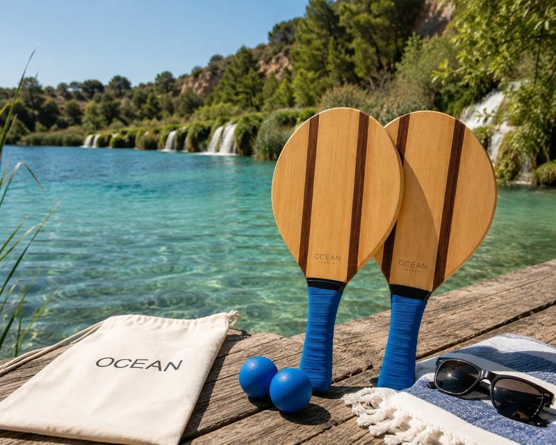 Ocean Paddle Premium Set of Wooden Beach Paddles, 2 Frescobol/Beach Tennis Paddles with 2 Balls, Carrying Bag and 2 Sunglasses, Blue Handle - Image 3
