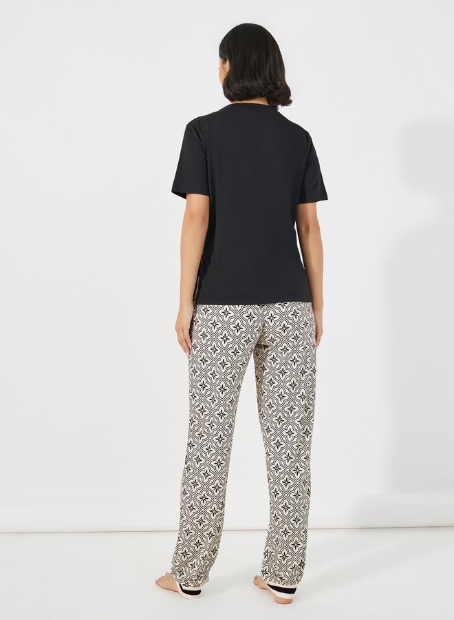 Styli Paris Slogan Print T-Shirt & Printed Cuffed Pyjama Set  - Image 5