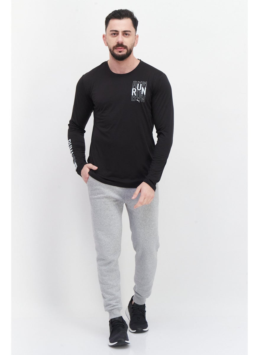 PUMA - تي شيرت رياضي مناسب للجري للرجال، أسود - Image 1