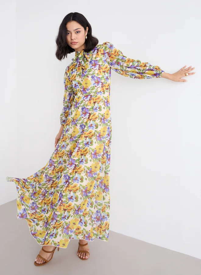 Styli Tie-Up Neck All Over Print Maxi Dress