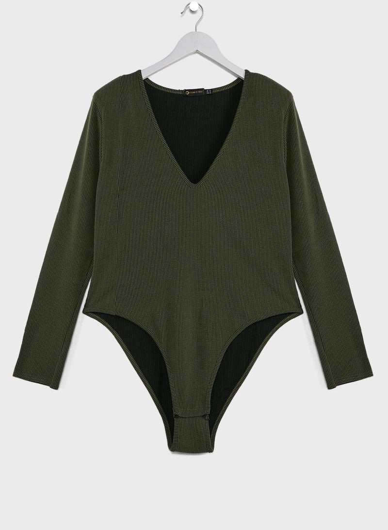 I Saw It First Curve Green Plus Contrast Rib Shoulder Pad Plunge Front - Image 1