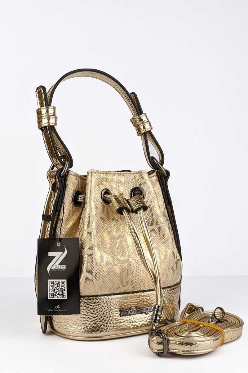 A women's handbag and shoulder bag - an elegant hobo-style design in a golden bag with golden accents.
