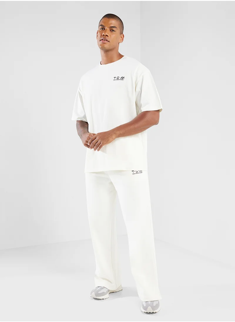 The Giving Movement Oversized Racing Printed T-Shirt