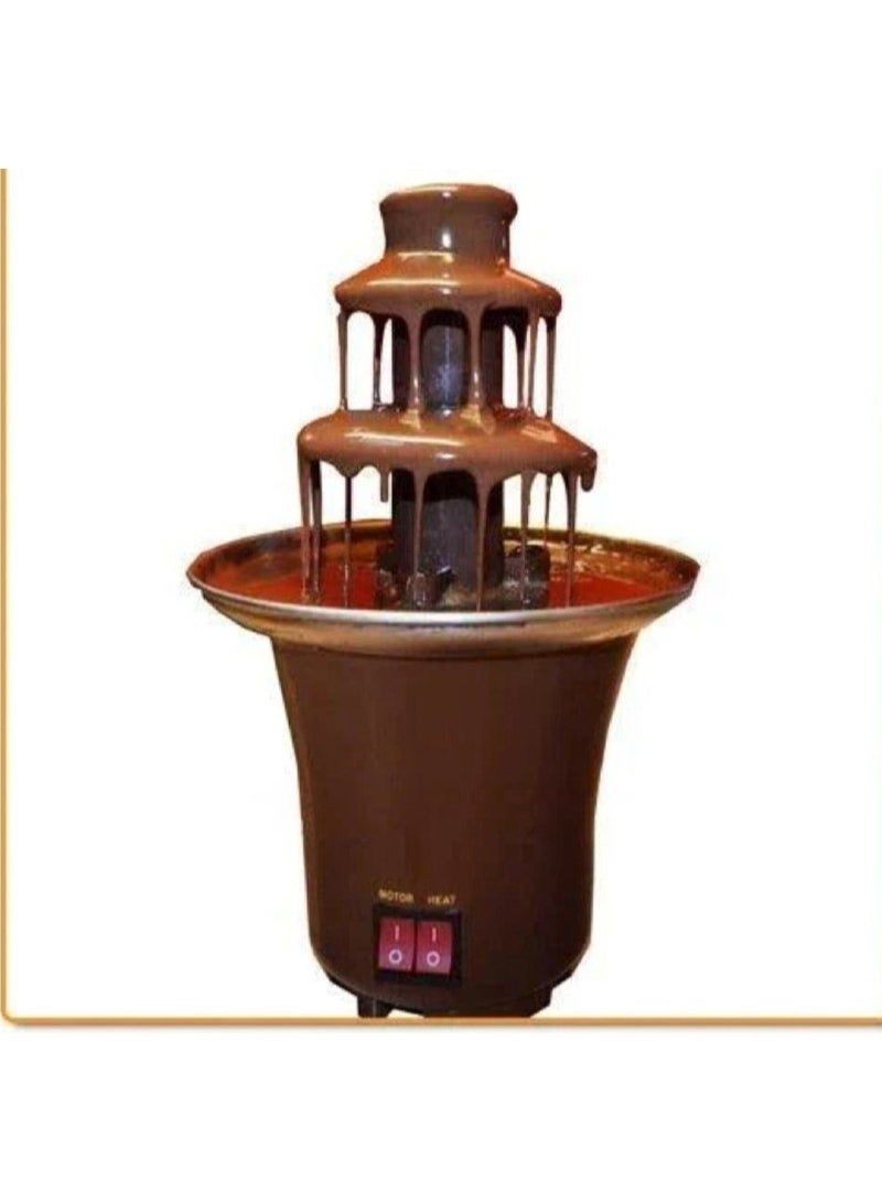 حلي أي قعدة ولمة عيلة بلمسة من السعادة! ✨🍫  وصلت الآن نافورة الشوكولاتة الكهربائية الـ 3 طبقات الأكثر طلباً! 😍 الماكينة السحرية اللي هتحول بيتك لكافيه، وتفرح أولادك وضيوفك في أعياد الميلاد والمناسبات . ليه الماكينة دي لازم تكون في بيتك؟ 🍓 مثالية لغمس الفواكه (الفراولة، الموز)، المارشميلو، والبسكويت . ⚙️ عملية جداً ومصنوعة من مواد آمنة وسهلة التنظيف والتفكيك. 🔥 حجمها مثالي ومزودة بزر تسخين للحفاظ على الشوكولاتة سايحة وسلسة طول الوقت - Image 2
