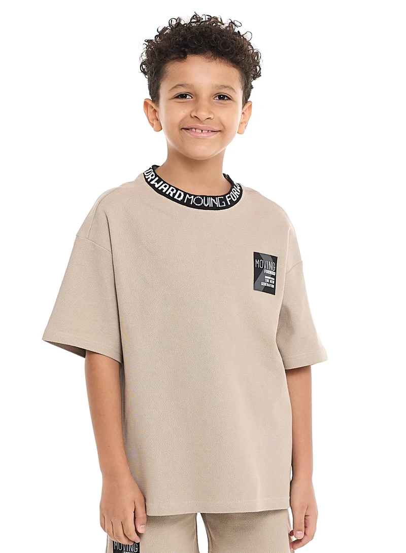victor and jane Victor and Jane Boys' Cord Set – Beige T-Shirt and Shorts Outfit with Label Detail