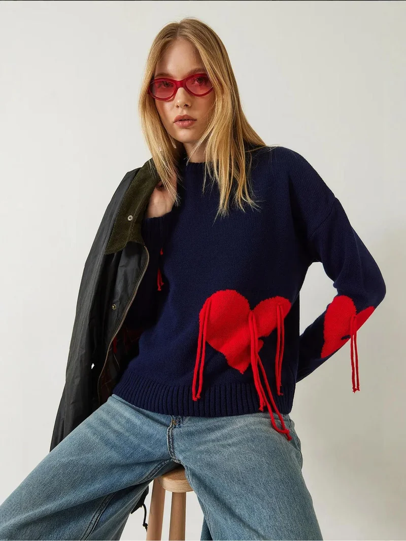 بيانكو لوتشي كنزة بياقة دائرية بنقشة قلب مكشكش من لوتشي