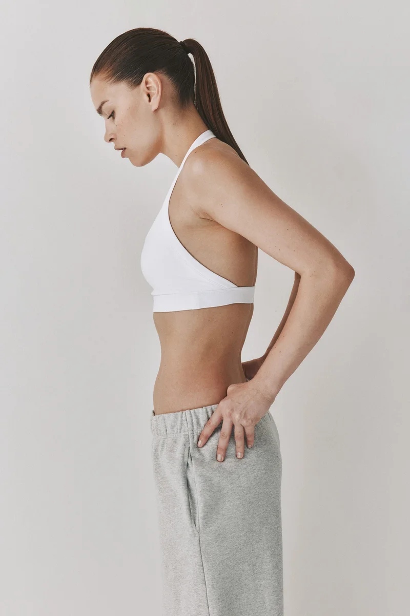 H&M  Light Support Halterneck sports bra with SoftMove™ for Women | Best Price UAE