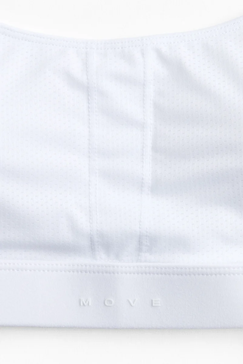 H&M  Light Support Halterneck sports bra with SoftMove™ for Women | Best Price UAE